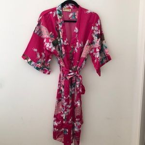 Pink satin robe with peacock floral design